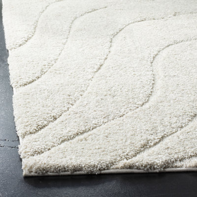 Ashal Abstract Cream Area Rug