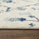 Tapis géométrique blanc / bleu / beige