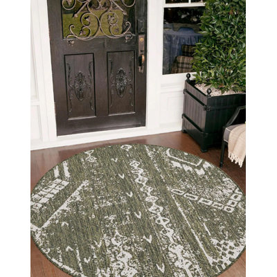 Tapis géométrique vert foncé / ivoire en polypropylène tissé à la machine Elpida