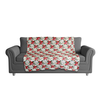 Jeté polaire rouge à motif floral