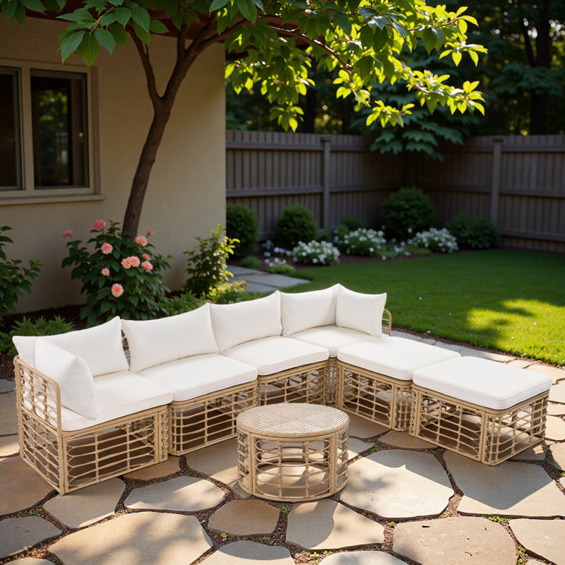 Ensemble de canapé modulaire d'extérieur en rotin 7 pièces avec coussins épais, conception tissée creuse et pieds réglables 7 pièces