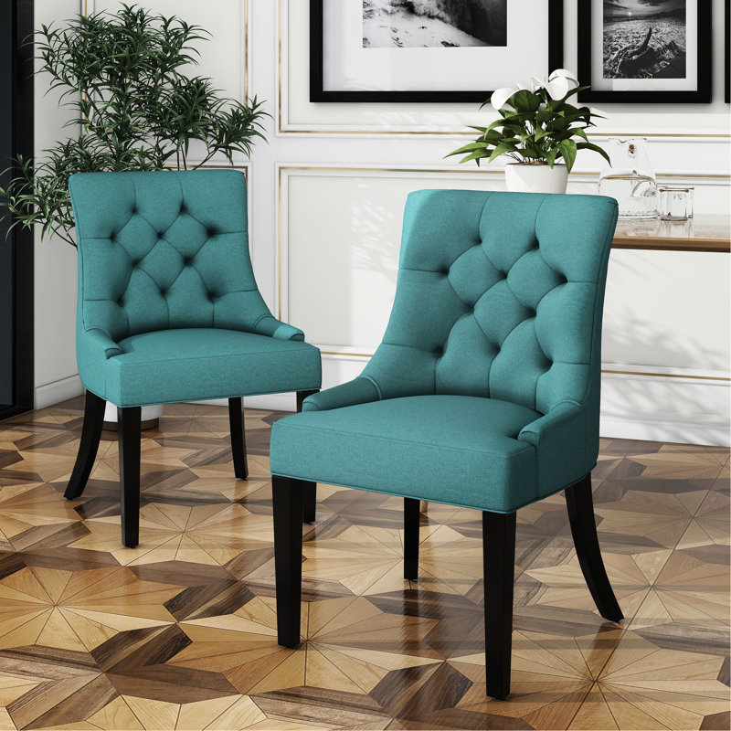 2 chaises de salle à manger - Style contemporain, surpiqûres en losange, accoudoirs inclinés, revêtement, pieds en bois, bleu sarcelle. 2 chaises au design contemporain avec dossier, revêtement en tissu, coloris uni.