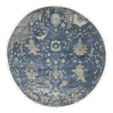 Debarghya Hand Knotted Wool Area Rug in Blue