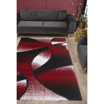 Tapis à poil long rouge à motif géométrique Allerus