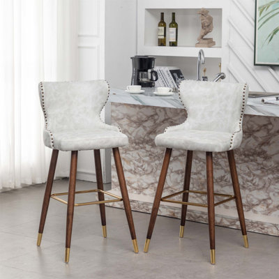 Mid-Century Modern Faux Leather Tufted Nailhead Trim Barstool Set, Perfect For Stylish And Comfortable Seating In Any Home Or Bar.