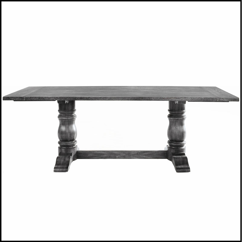 Table rectangulaire à tréteaux avec piédestal double tourné, charme rustique et élégance moderne pour un repas spacieux