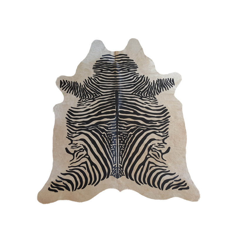Tapis noir / beige en peau de vache à imprimé animal