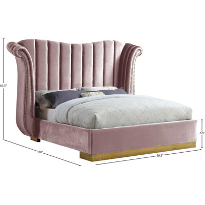 Cicero Upholstered Wingback Bed