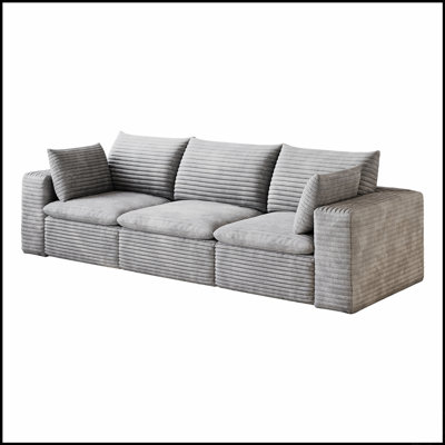 Canapé modulable en velours côtelé à assise profonde, avec coussins amovibles et sans assemblage requis, pour des espaces de vie polyvalents.