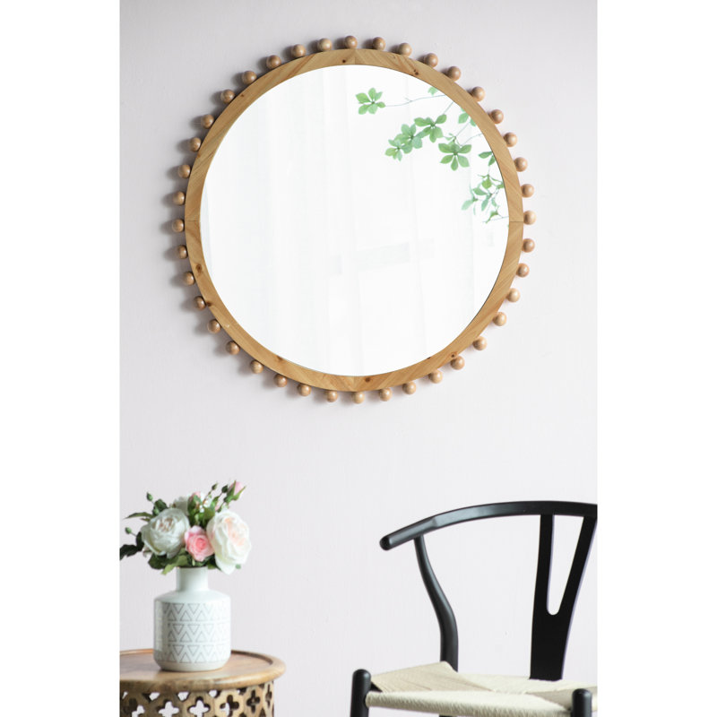 Grand miroir rond à cadre perlé en bois pour espace de vie avec maison décorative