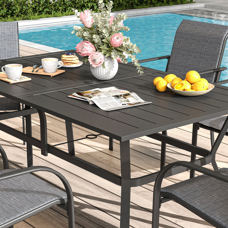 Cihangir Rectangular 6 - Person 60'' L Outdoor Patio Dining Set with 6 Stackable Textilene Armrest Chairs, Gray