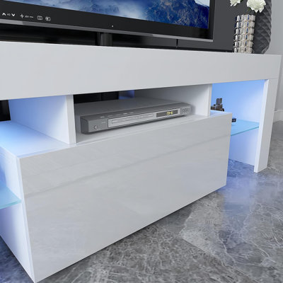 Meuble télé à DEL pour téléviseur de 55 po ou moins, meuble audio-vidéo moderne avec porte en duvet, tablette en verre et façade UV ultrabrillante, console télé pour le salon, la chambre à coucher, blanc