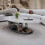 Table basse en marbre avec base sculpturale en acier inoxydable-691929686