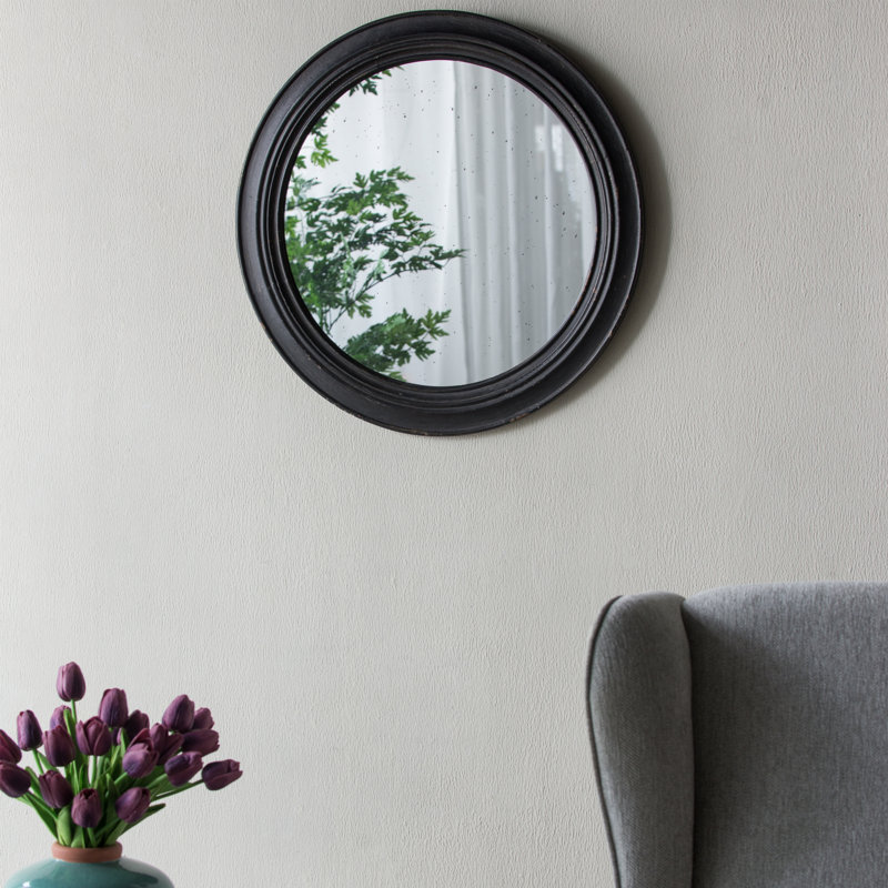 Miroir mural circulaire avec cadre en bois noir