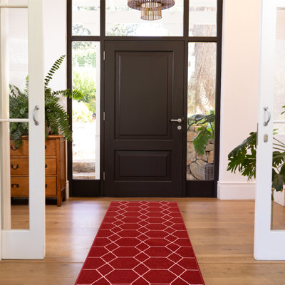 Tapis rouge à motif géométrique Devoe