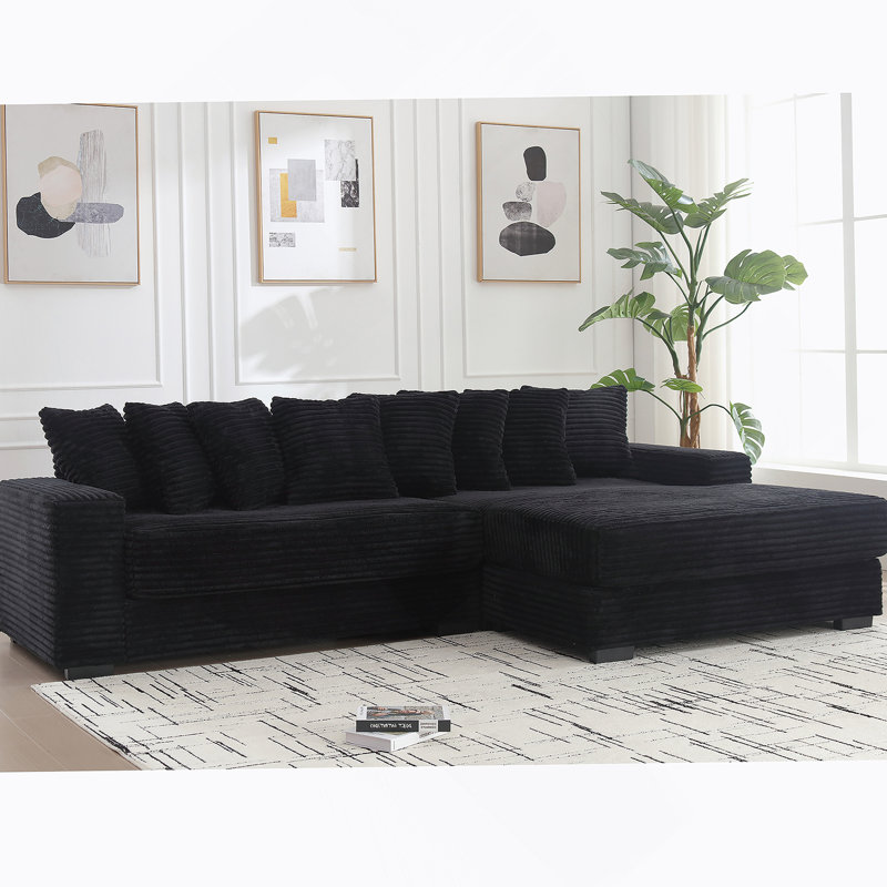 Canapé confortable surdimensionné en velours côtelé avec plusieurs coussins pour la détente