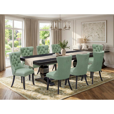  Cet ensemble de cuisine 9 pièces de style Mid-Century comprend une table en bois et 8 chaises de cuisine en tissu de polyester gris clair avec dossier capitonné à boutons - finition noire sablée.