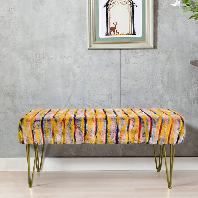 Mapoles Upholstered Ottoman, Orange Faux Fur