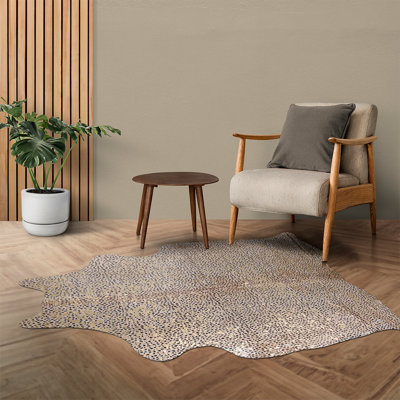 Tapis guépard beige personnalisé avec peaux de vache métalliques dorées personnalisées