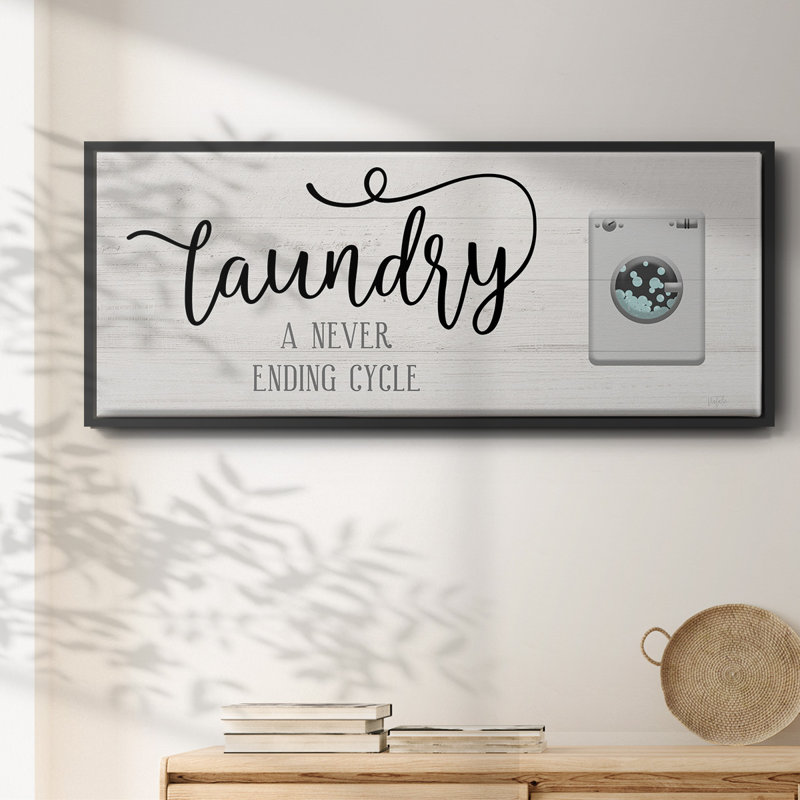 " Never Ending Laundry ", 25" H x 45" W x 1" D, Black Framed Canvas