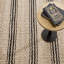 Tapis noir en jute tissé à la main-84973549