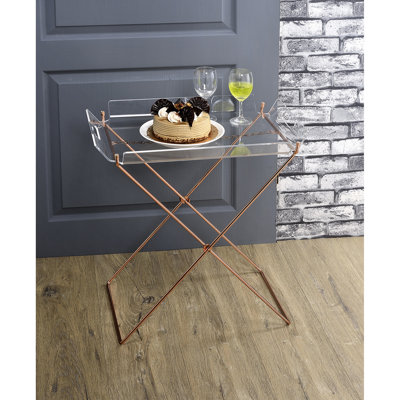 Table moderne en acrylique transparent avec base en forme de croix et plateau élégant en cuivre amovible pour le salon