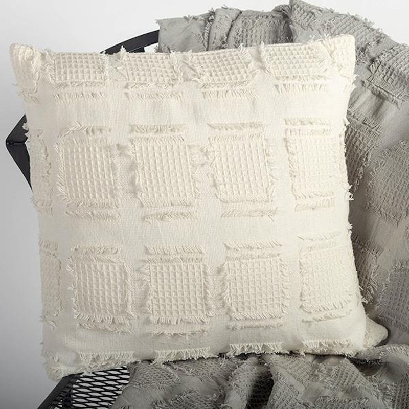 Housse de coussin à motif blanc