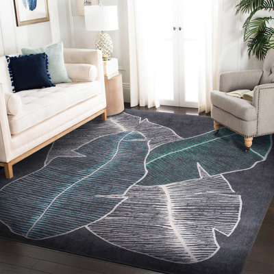 Tapis décoratif à motif floral noir et blanc à feuilles vertes