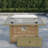 Propane Gas Fire Pit Table With Glass Wind Guard And An Open Basket-wave Patterned Wicker-947424577