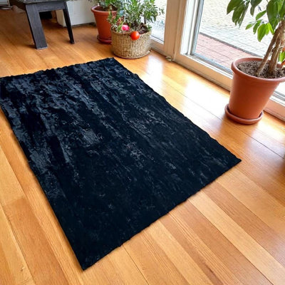 Tapis noir en fourrure de lapin_8 x 10 pi