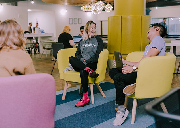 Wayfair employees laughing together