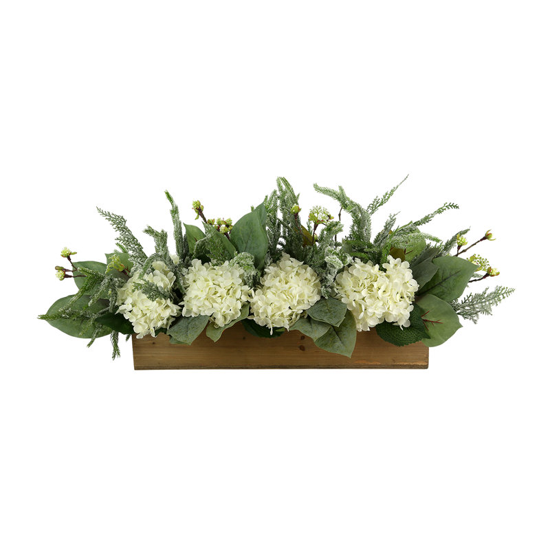 Holiday Arrangement with Wintry Greens and Hydrangeas