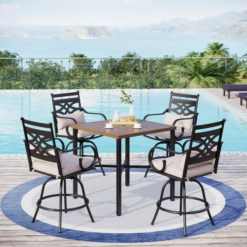 Alyne 4 - Person Stainless Steel Patio Dining Set Extendable Square Table with Cushions Included