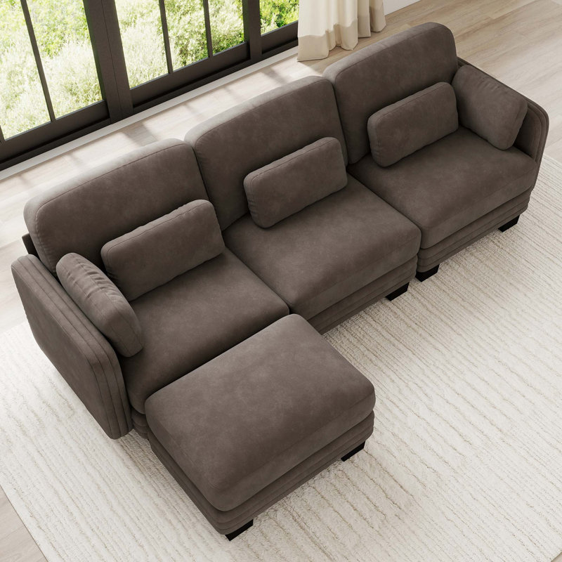 Canapé d'angle modulaire capitonné avec pouf amovible