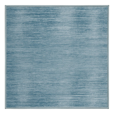 Tapis bleu uni lavable à la machine