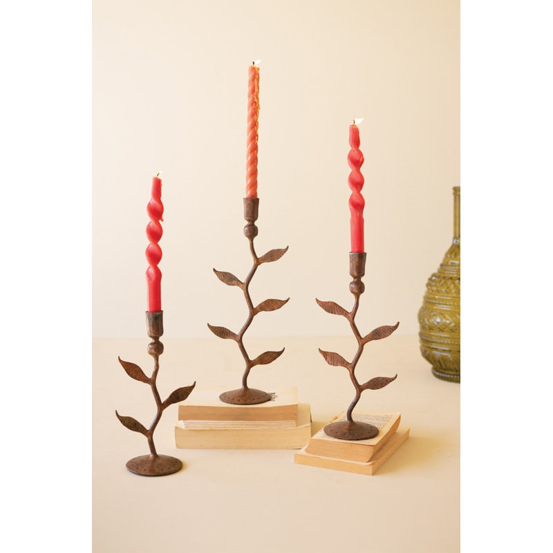 Ensemble de trois porte-bougies en fer