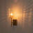 Dimmable Armed Sconce with Prismatic Glass Shade