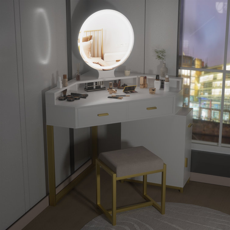 https://assets.wfcdn.com/im/57374258/resize-h755-w755%5Ecompr-r85/2427/242790964/Corner+Vanity+Desk+with+Lighted+Mirror+and+Stool.jpg