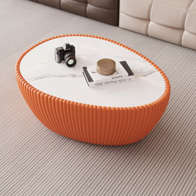 Canapé moderne en forme d'œuf avec plateau en marbre et base rembourrée