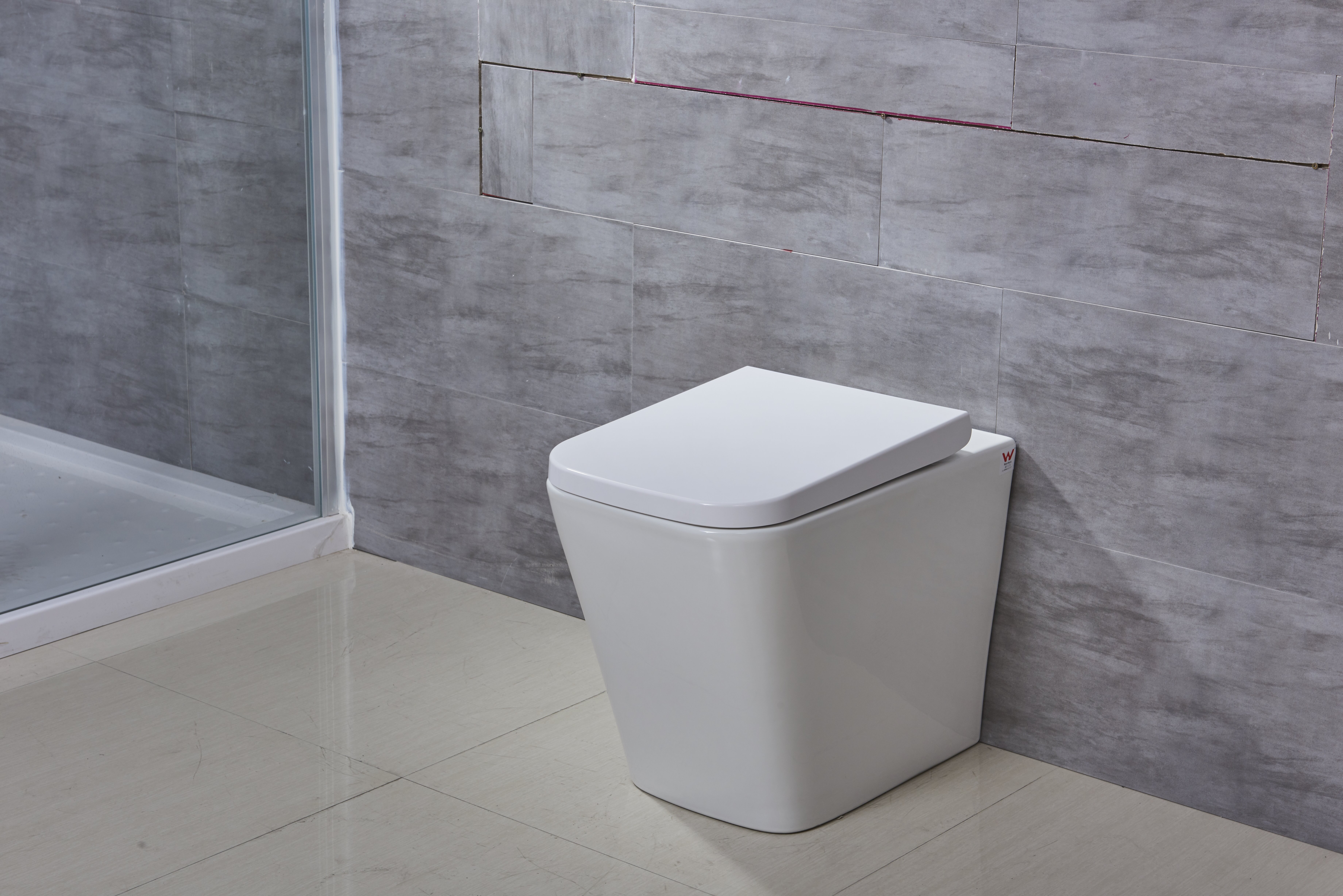 https://assets.wfcdn.com/im/57386067/compr-r85/8512/85122469/kdk-home-128-gpf-elongated-wall-mounted-wall-hung-toilets-seat-included.jpg