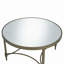 Table basse à finition miroir et laiton antique