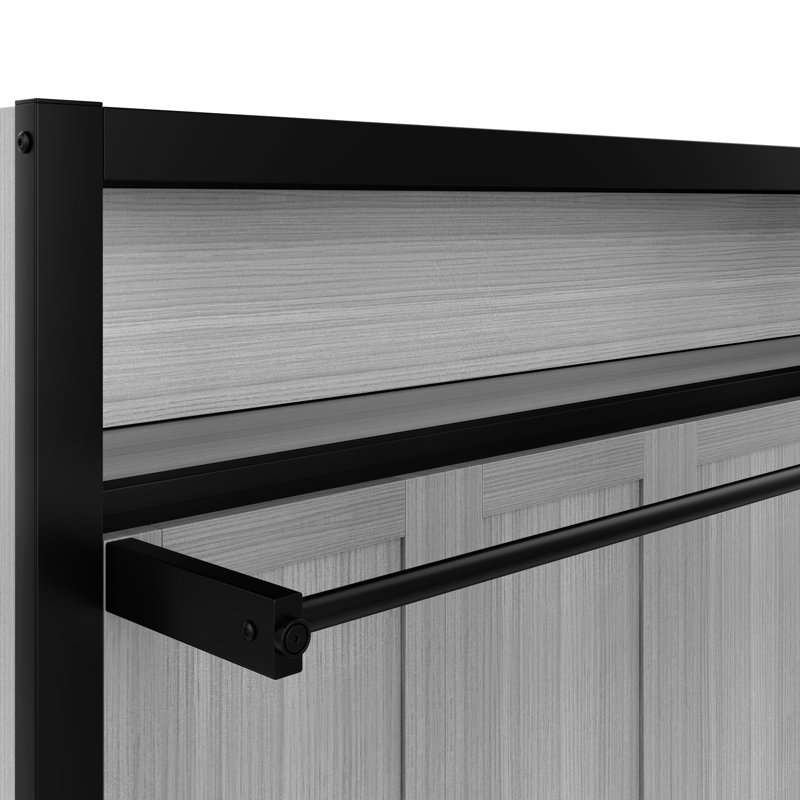 Lit simple gris pliable en métal avec tablettes, structure, peu encombrant, configuration rapide, construction idéale pour les bureaux à domicile