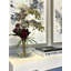 Orchid And Sedum Arrangement In Glass Vase