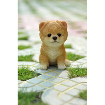 Sitting Pomeranian Puppy Statue