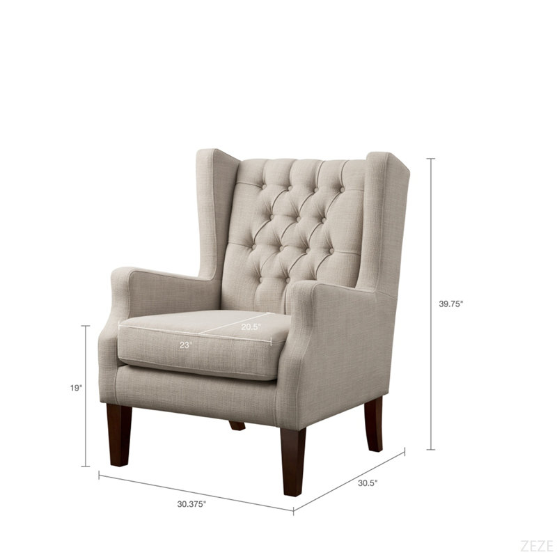 Fauteuil à oreilles capitonné