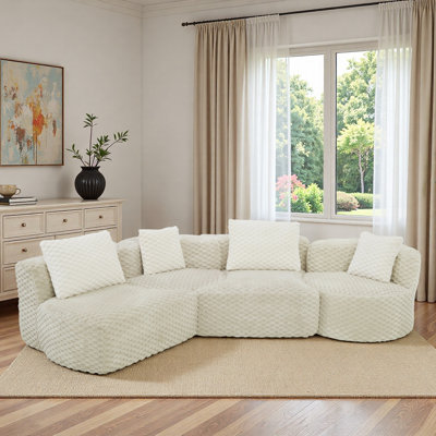 Canapé modulaire modulaire avec silhouette arrondie et coussins