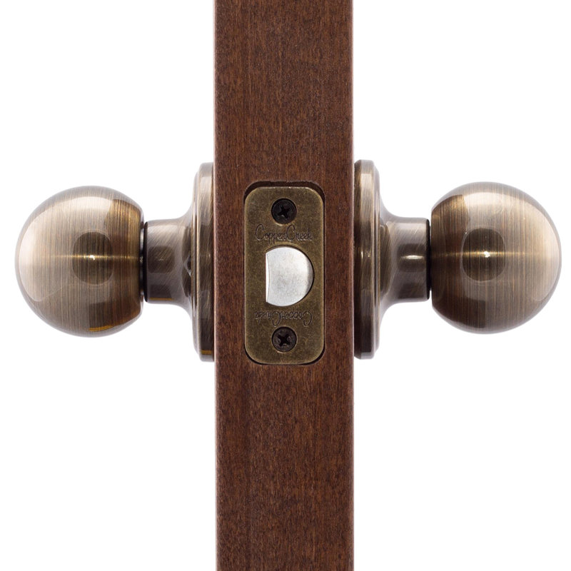 Bouton de porte de passage avec rosette rond Ball, Laiton antique