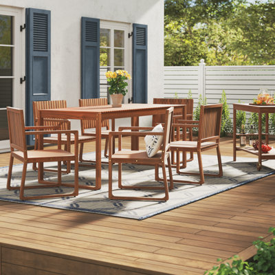 Crayton 6 - Person Acacia Rectangular Solid Wood Patio Dining Set with Cushions included