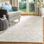 Tapis ivoire / bleu clair en laine touffeté à la main Swanner-365956501
