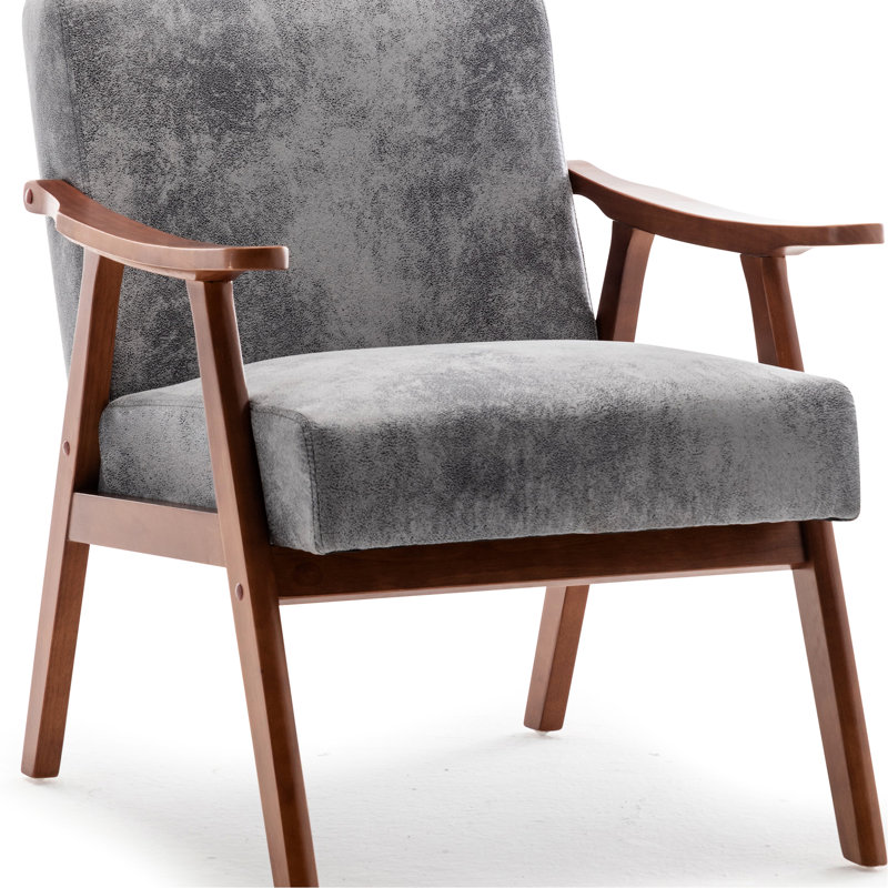 Chaise recouverte de velours avec une silhouette emblématique de style Mid-Century, structure en bois stable et revêtement doux